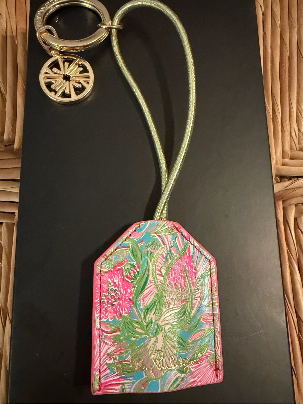Lily Pulitzer keychain with hidden dual chargers
